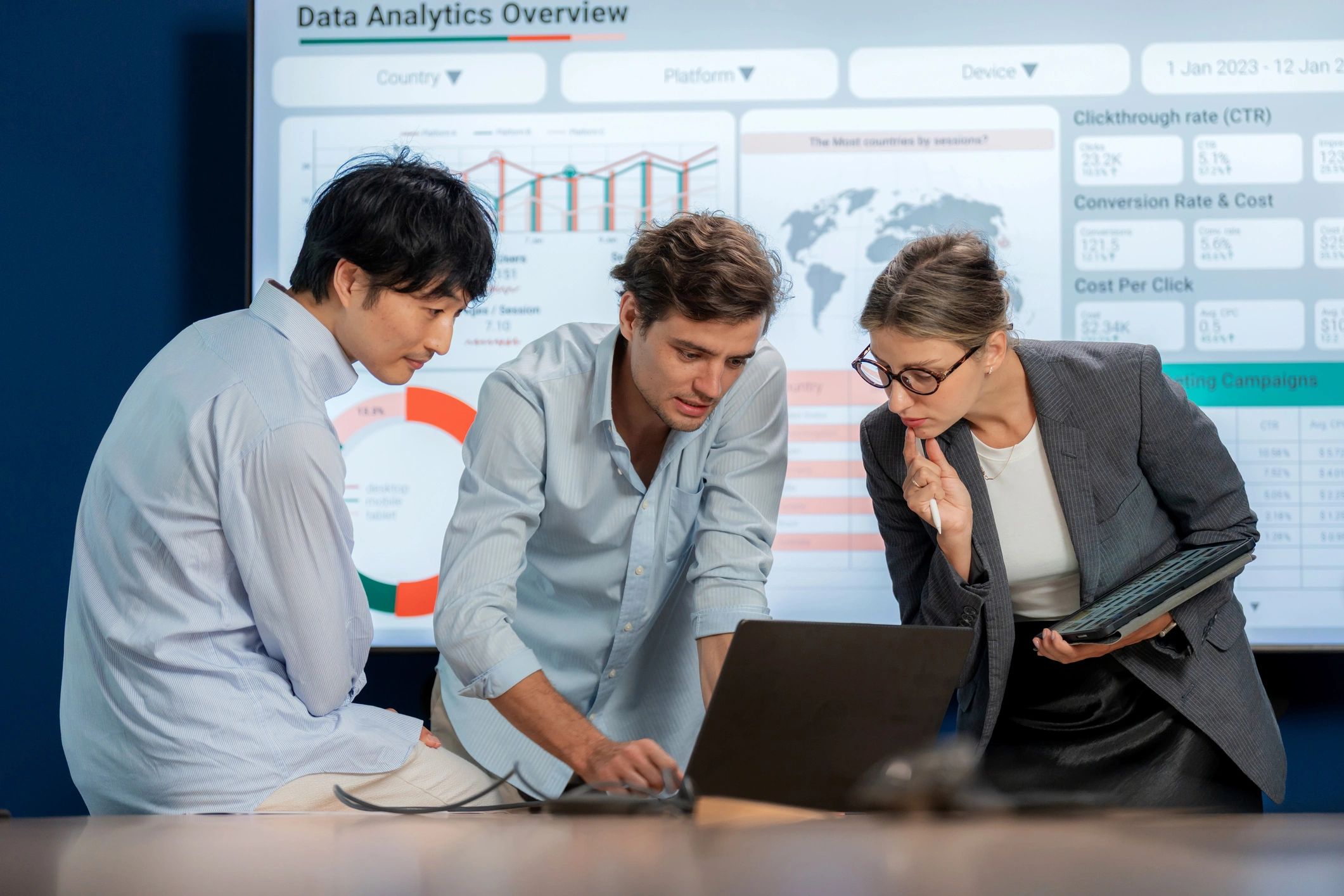 Team reviewing shipping cost data and charts